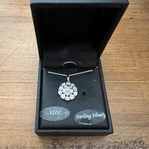 Diamond flower burst stud earrings & pendant.